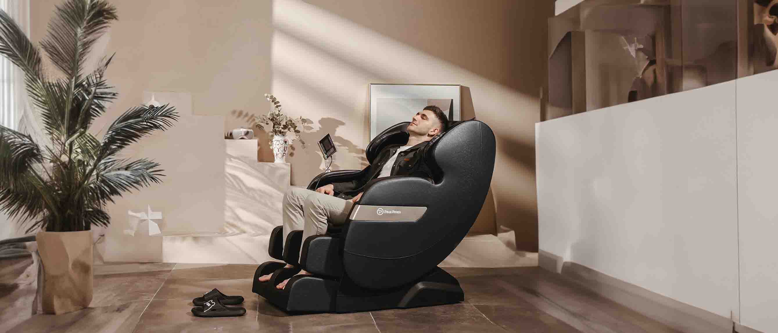 Image of man on massage chair in living room