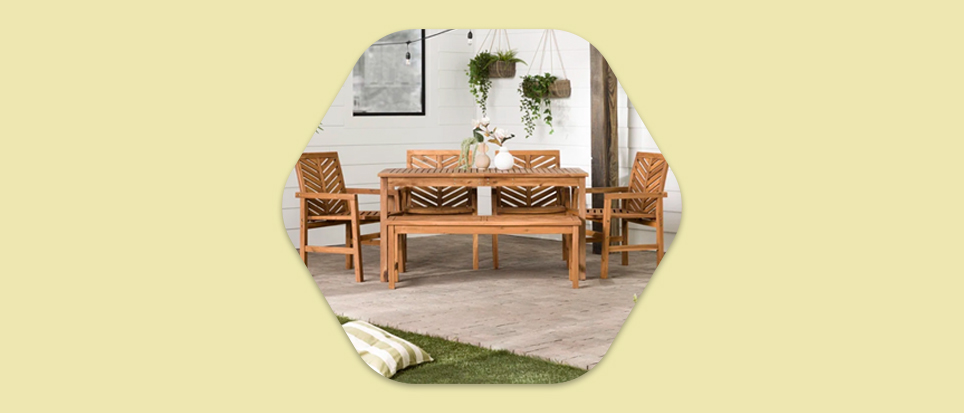 Set of four outdoor dining chairs and table against a yellow background