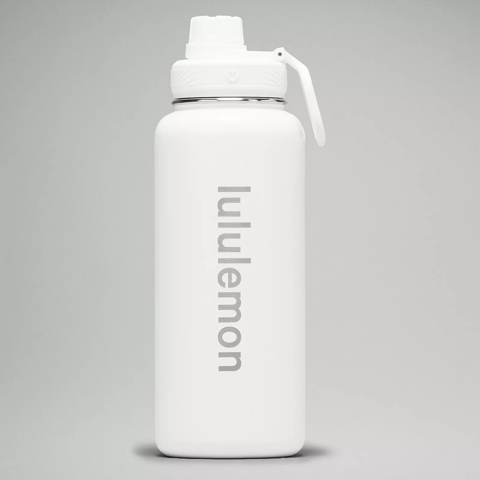 Lululemon Back to Life Sport Bottle in all white with lid and carry accessory