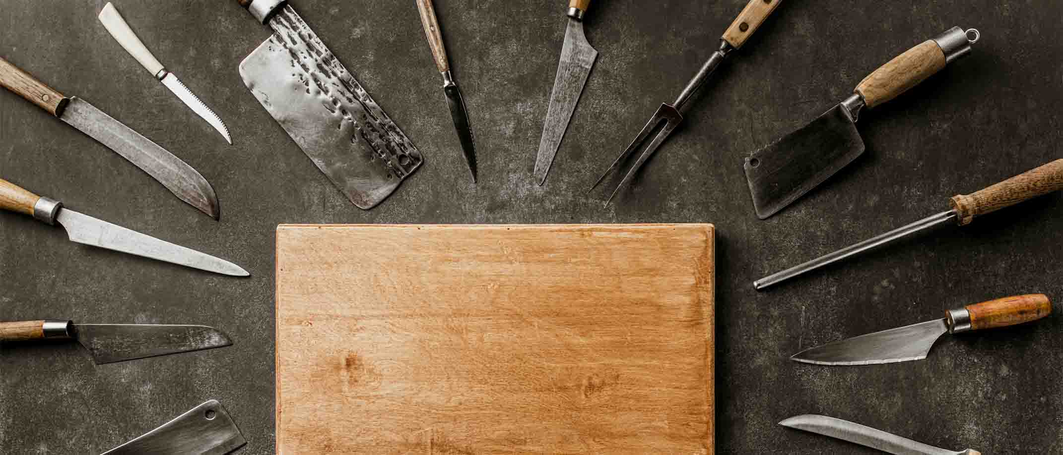 Image of different types on knives and cutting board
