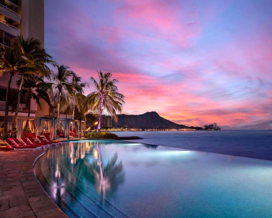 pool and sunset at the sheraton waikiki hotel in hawaii