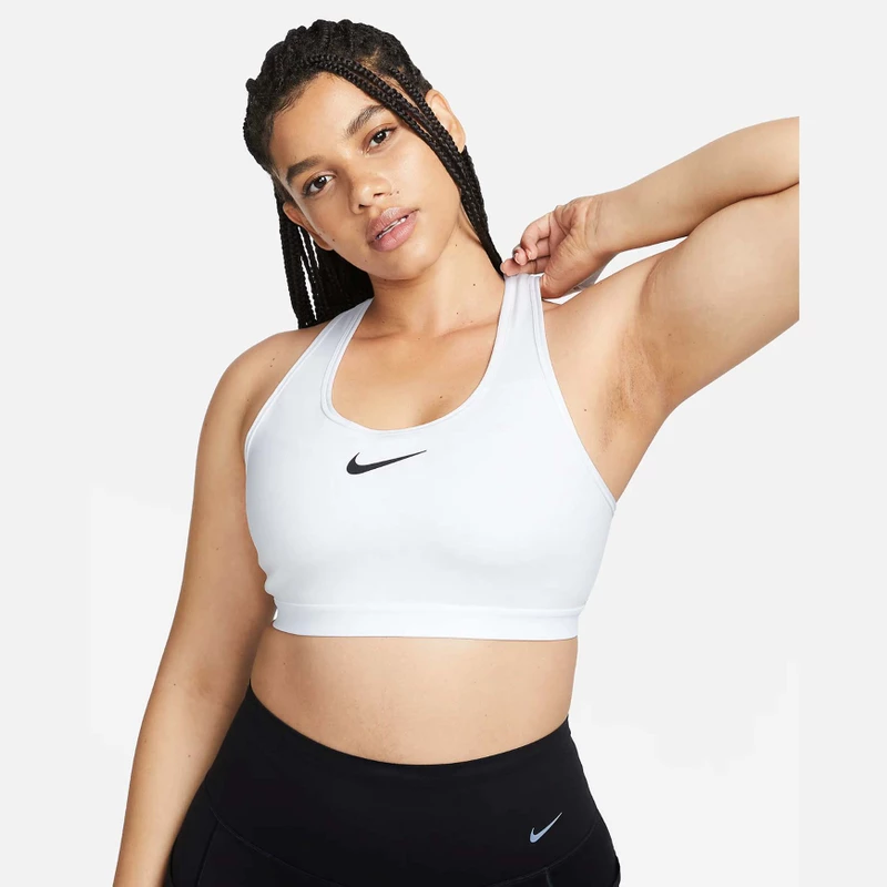 model wearing Nike Swoosh High Support Women's Non-Padded Adjustable Sports Bra in white 