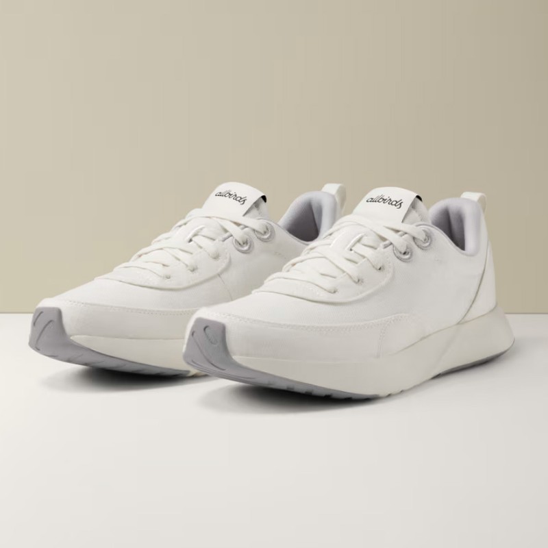 A pair of Allbirds white and grey sneakers 