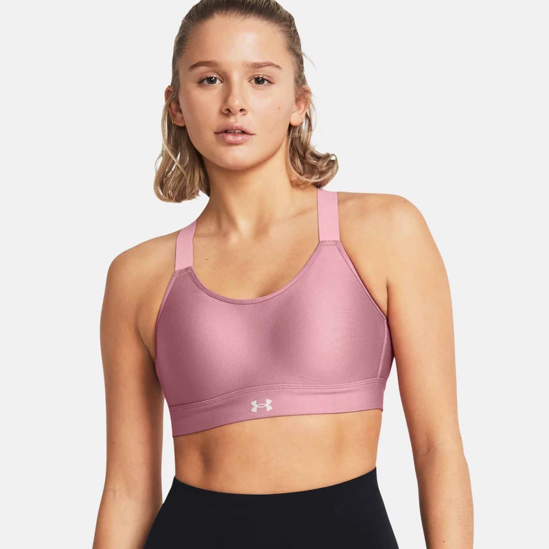 model wearing UA Continuum High Sports Bra in pink