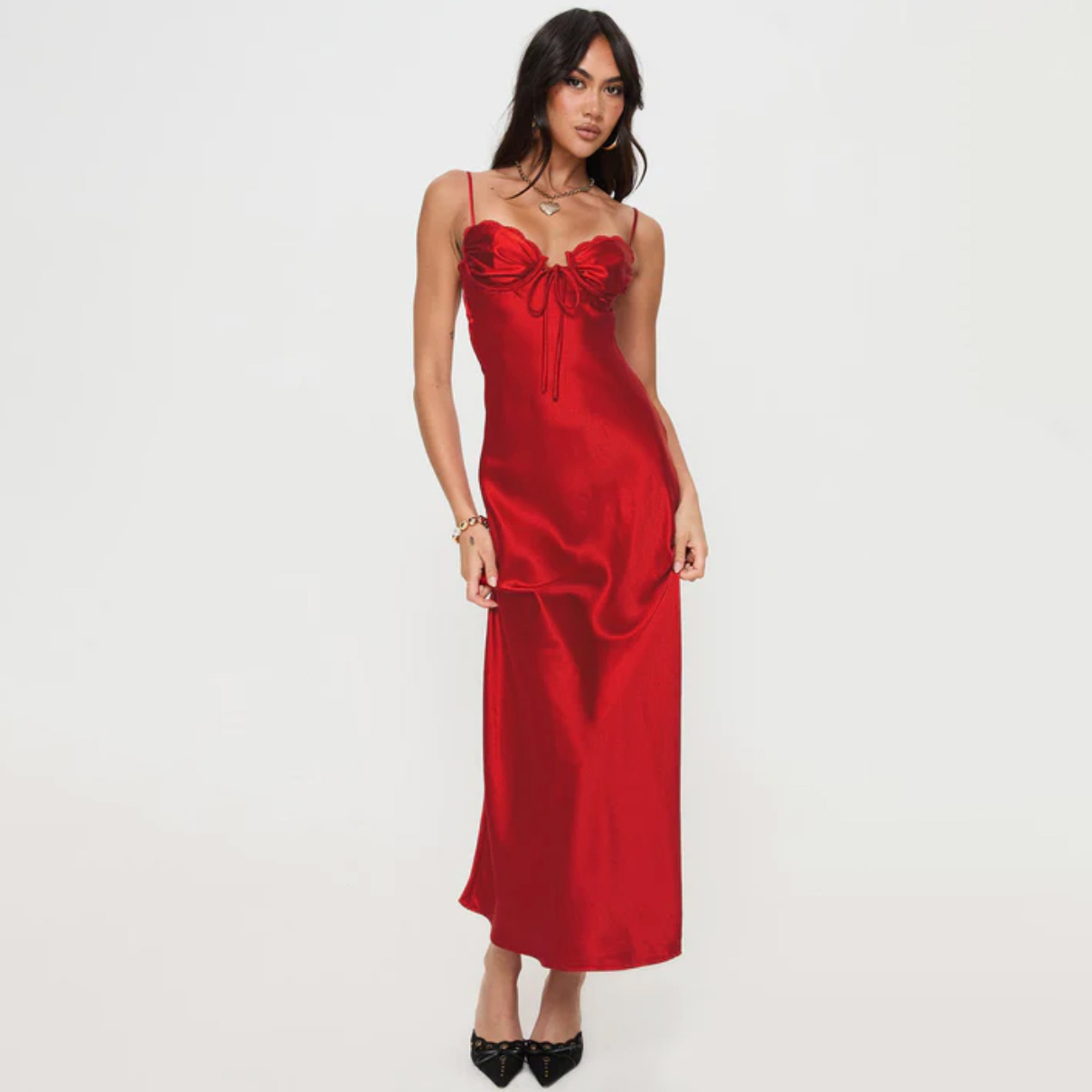 Woman wearing long red satin dress