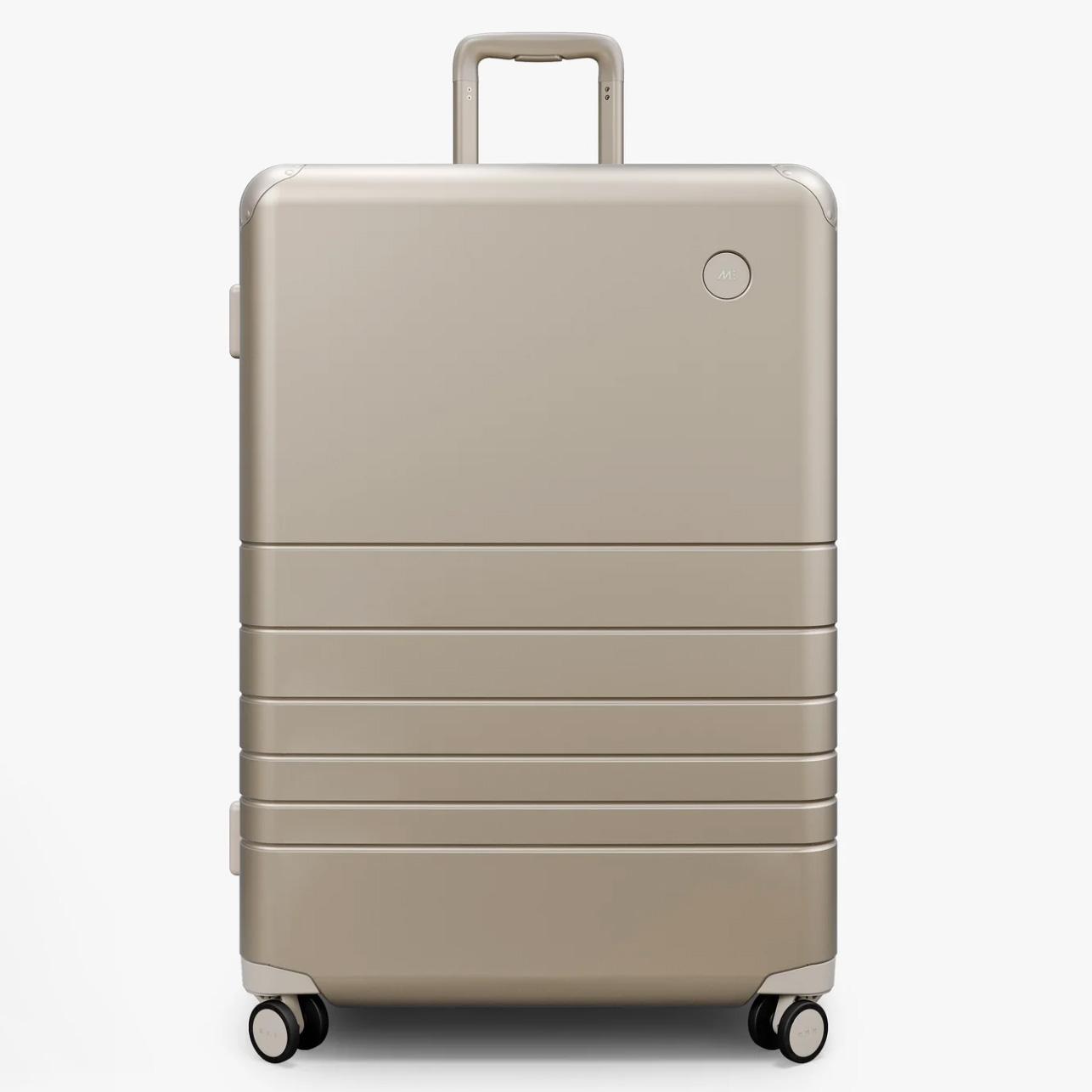 Monos hardside luggage in champagne