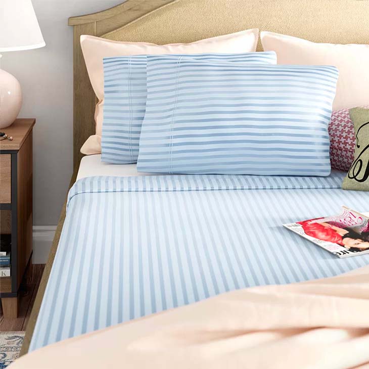 Striped blue sheets and pillowcase