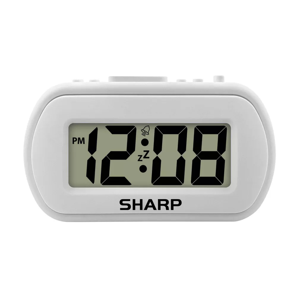 Sharp 1-Inch LCD alarm clock in white with the time showing as '12:08'