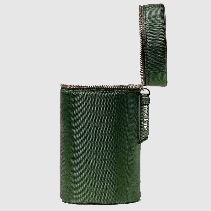 Cylinder-shaped toiletry bag in dark green