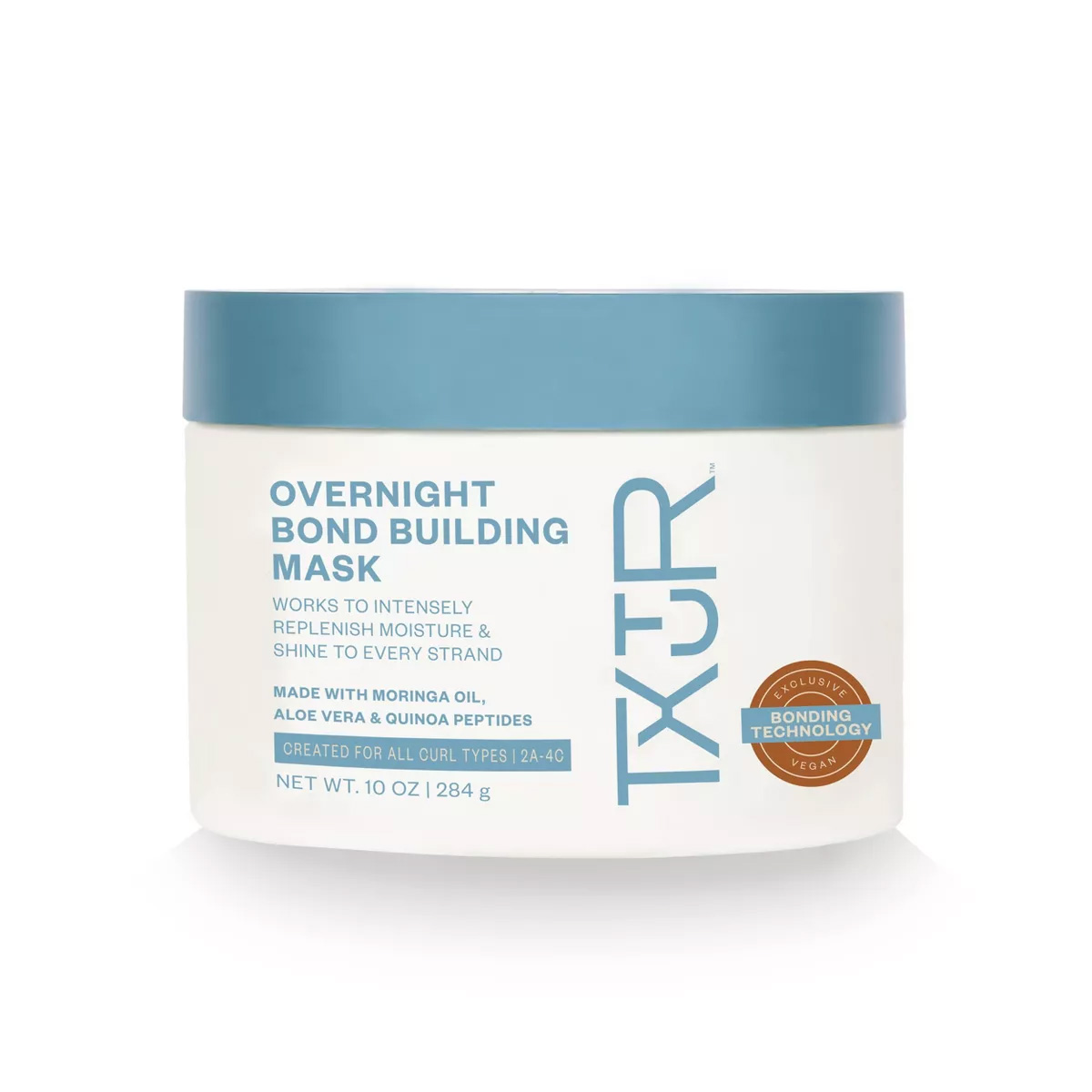 TXTUR Overnight Bond Building Mask in white and blue tub