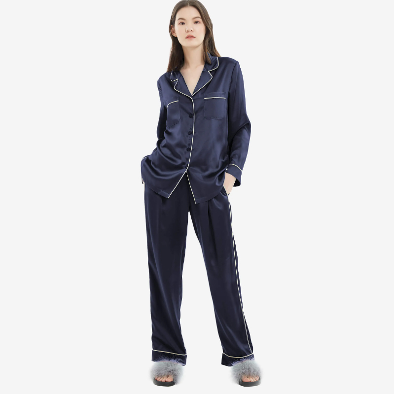 Model wearing navy silk pajama set 