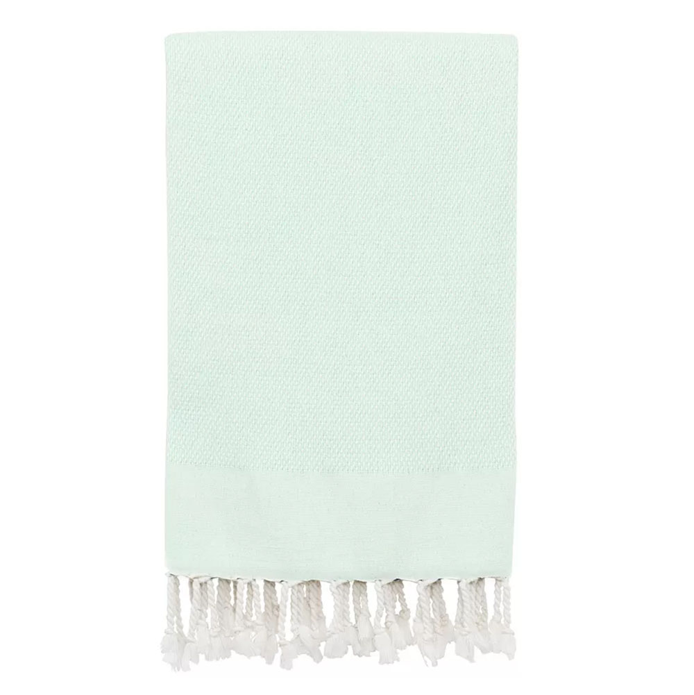 the Textiles Turkish Cotton Fun in Paradise Beach Towel in light blue with white tassels