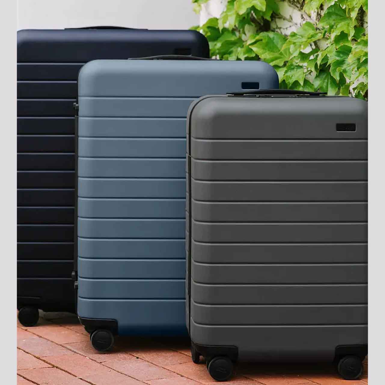 Away Luggage Set in black, blue, grey