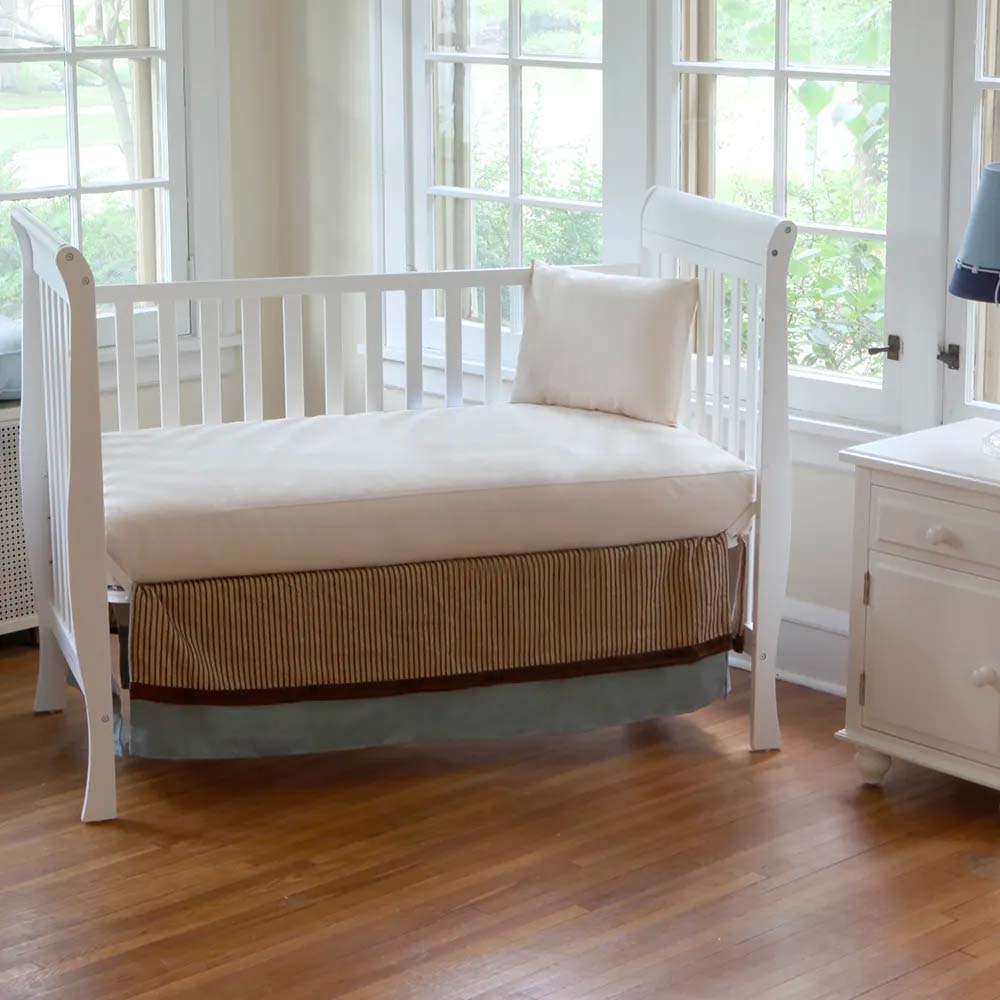 naturepedic crib mattress in nursery