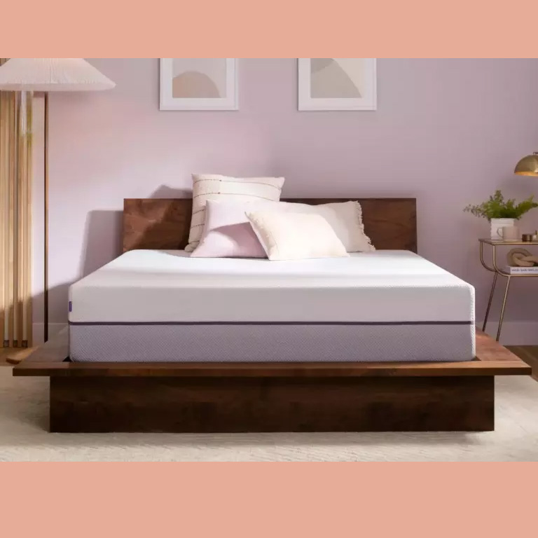 Purple Plus mattress with bed frame in a bedroom setting
