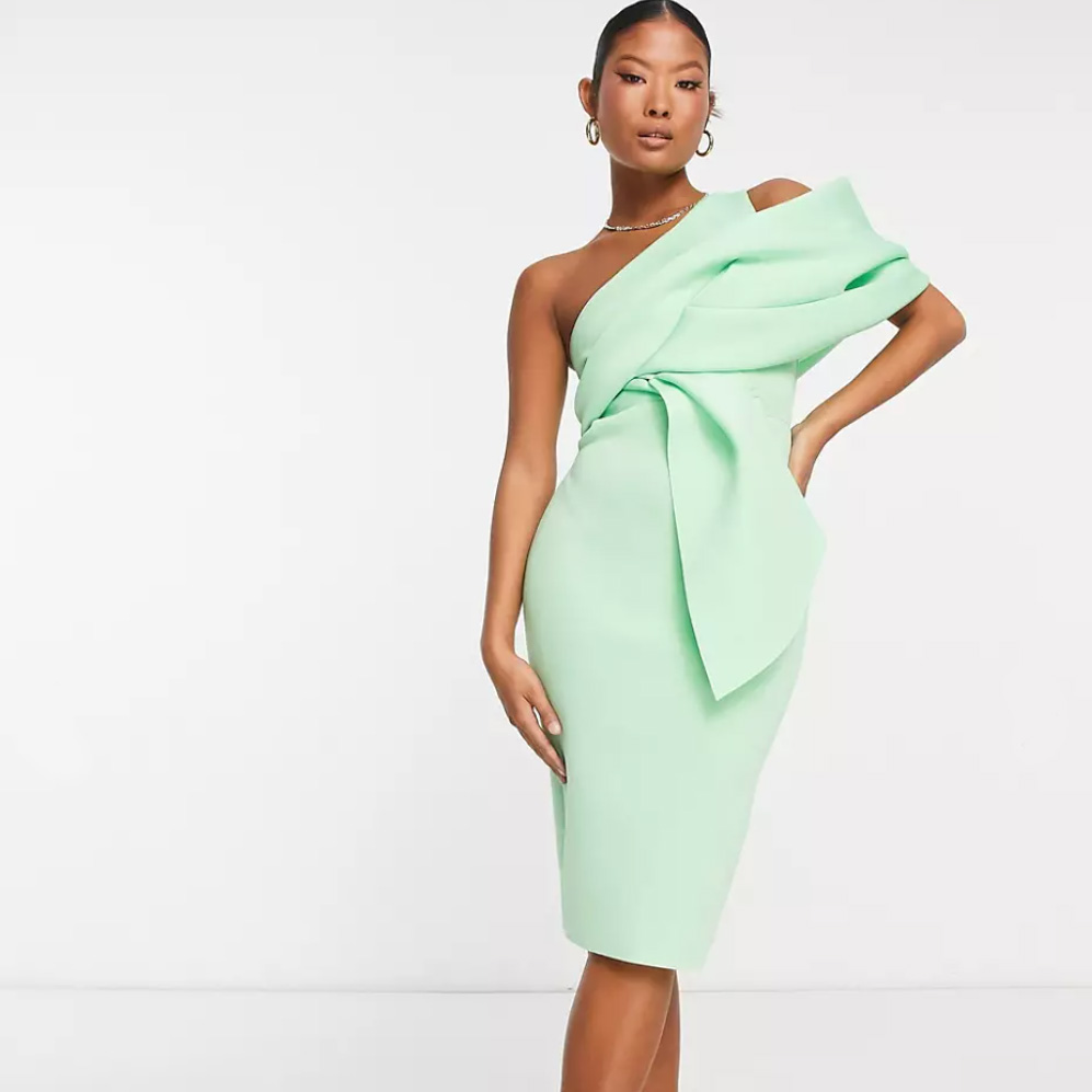 model posing in green midi dress from ASOS