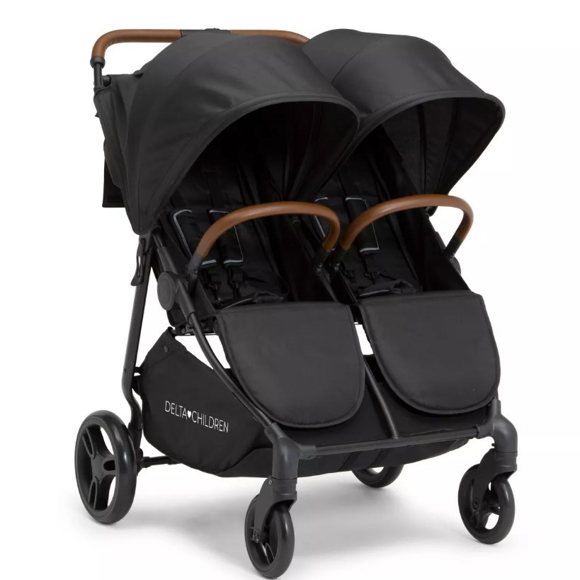 Delta Cruzer side by side stroller in black with canopy