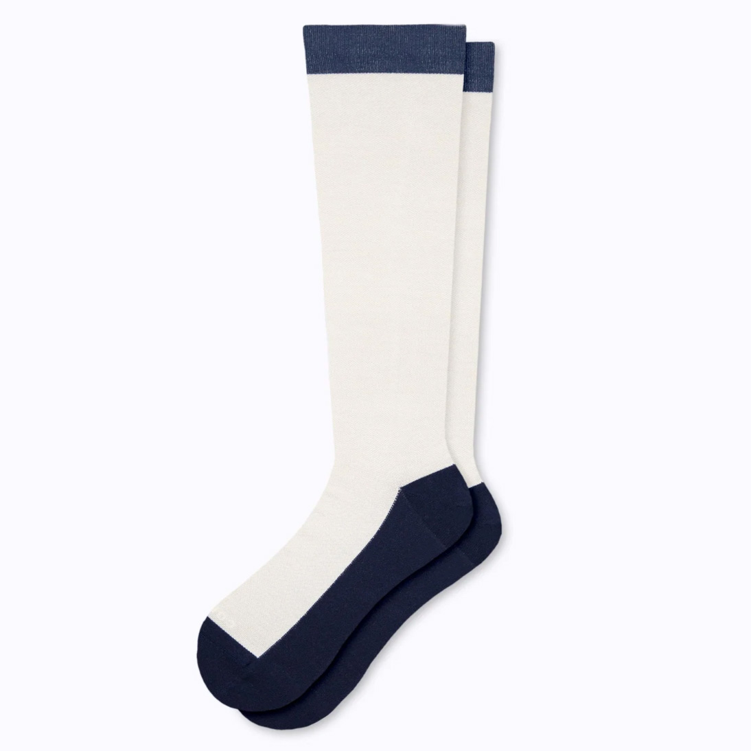 A pair of black and white knee-length socks