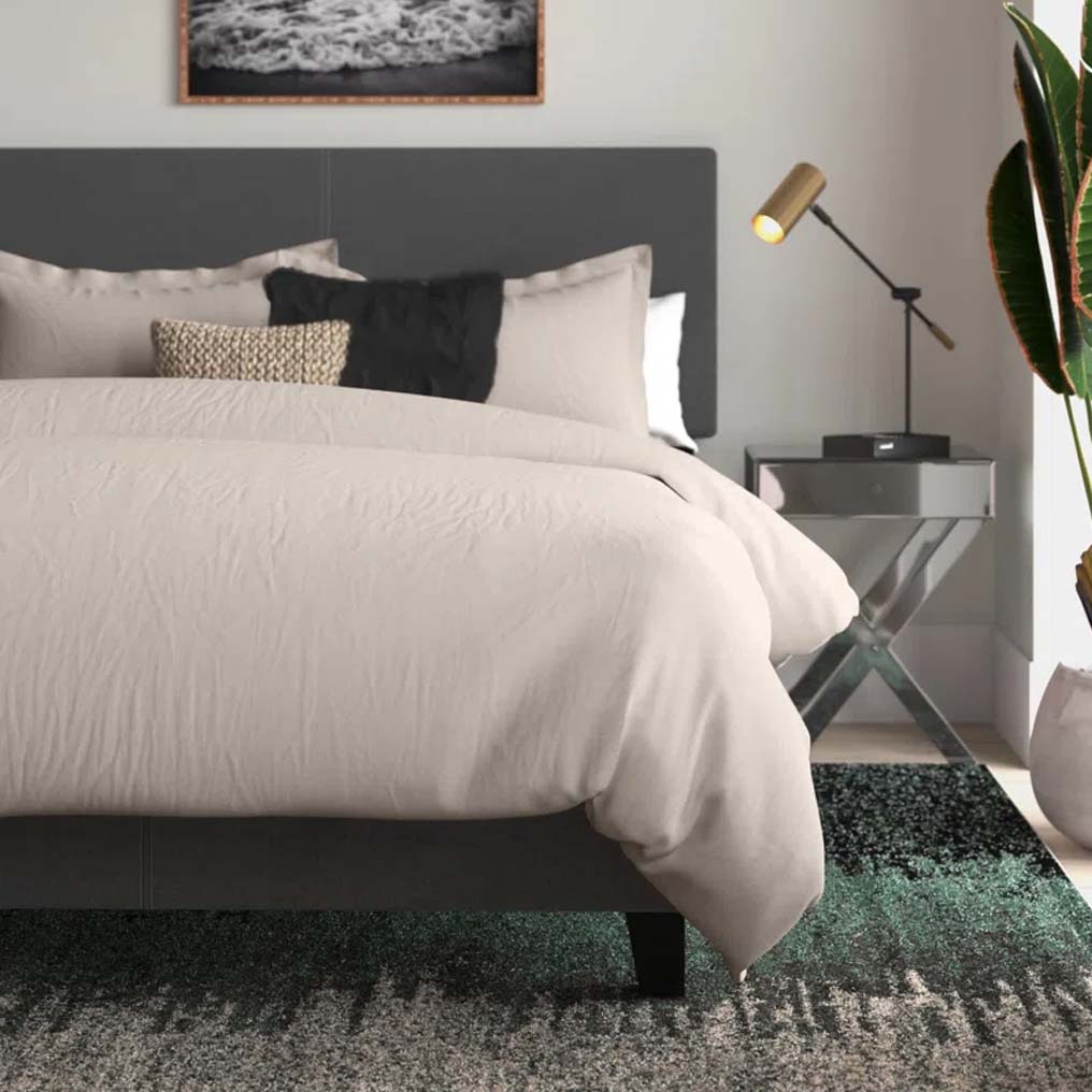 Cream bedding set in bedroom setting