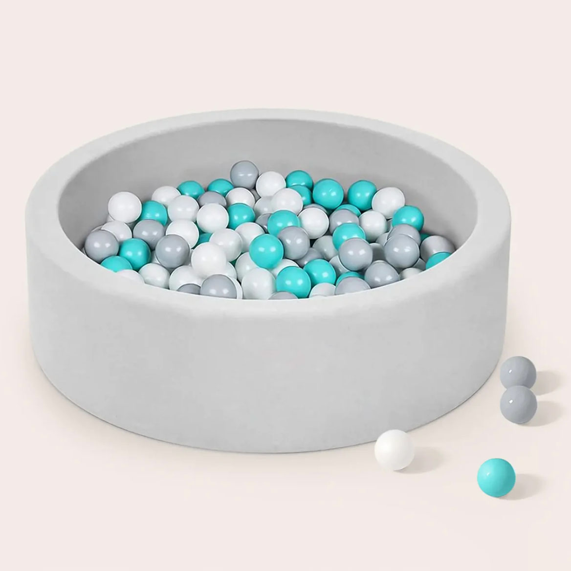 White, grey and blue balls in a pit pool