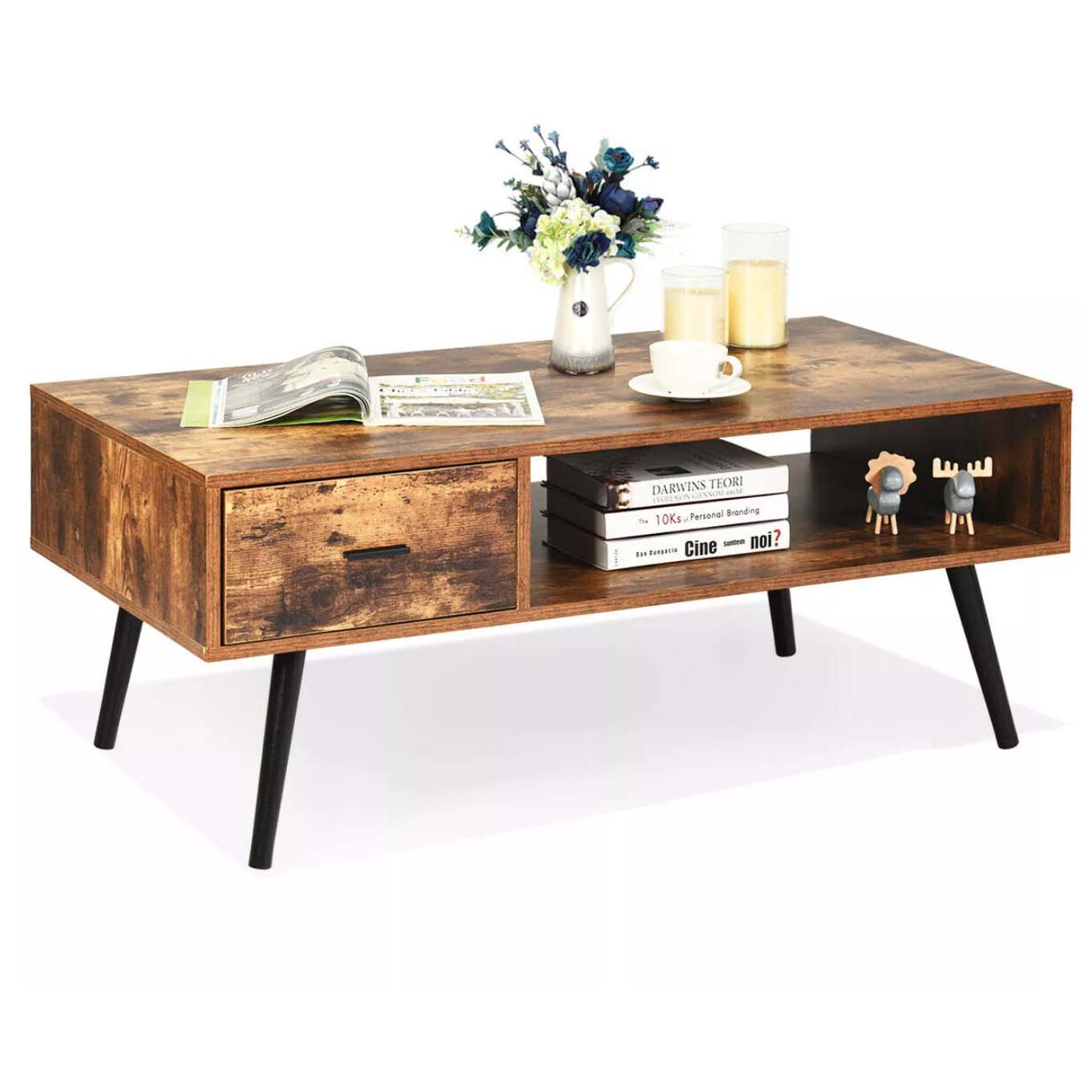 Coffee table in dark wood with home decor on display