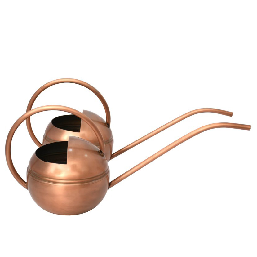 two pairs of round-shaped, brass watering can