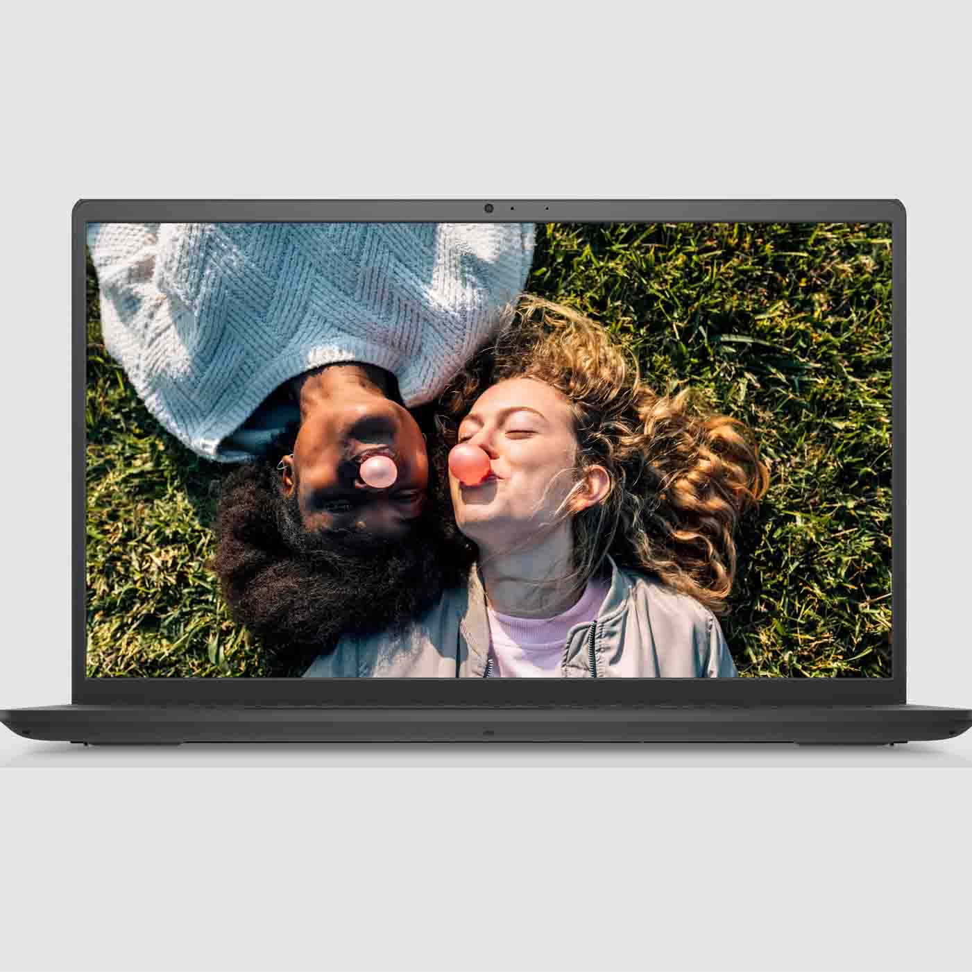 open dell laptop with picture of friends on screen