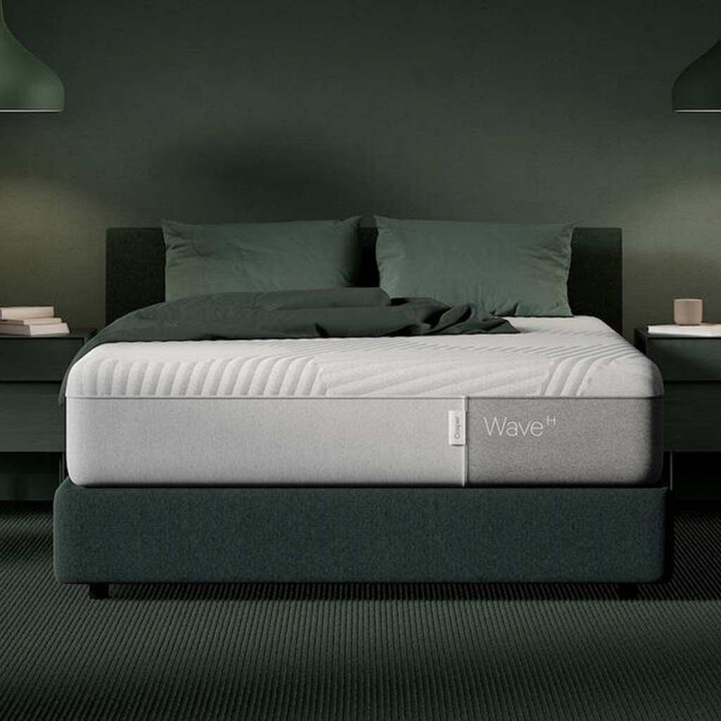 Wave Hybrid Mattress on a grey bed frame with two pillows