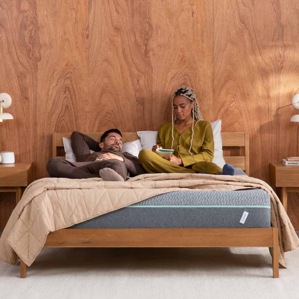 a couple lying down on the Bestselling T&N Mint Mattress