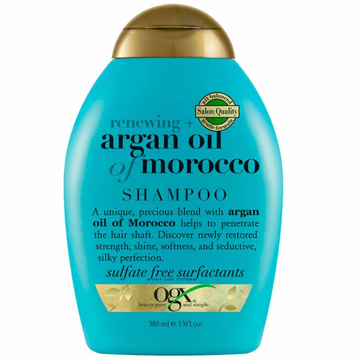 Turquoise bottle with gold cap of OGX argan oil of morocco shampoo