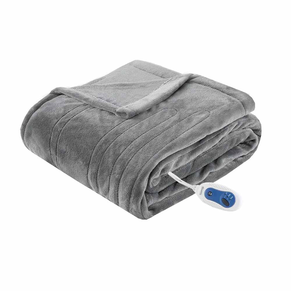 grey heated electric throw with a controller for temperature settings 