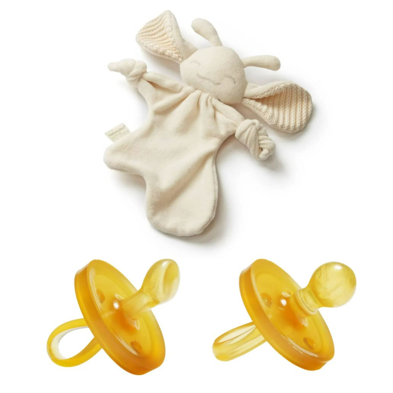 2 yellow pacifiers and a comforter
