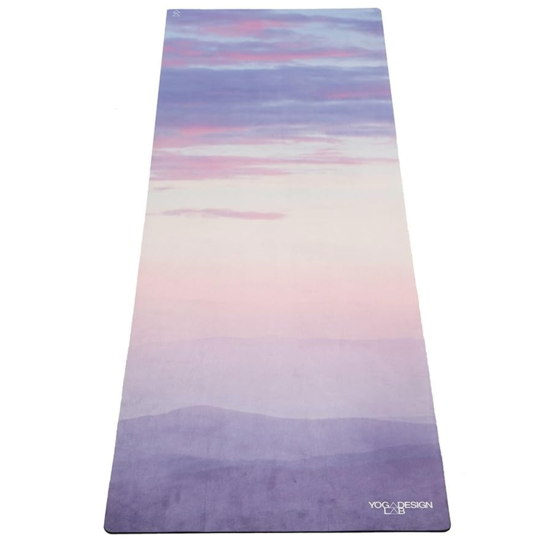 Yoga mat with purple and pink hue