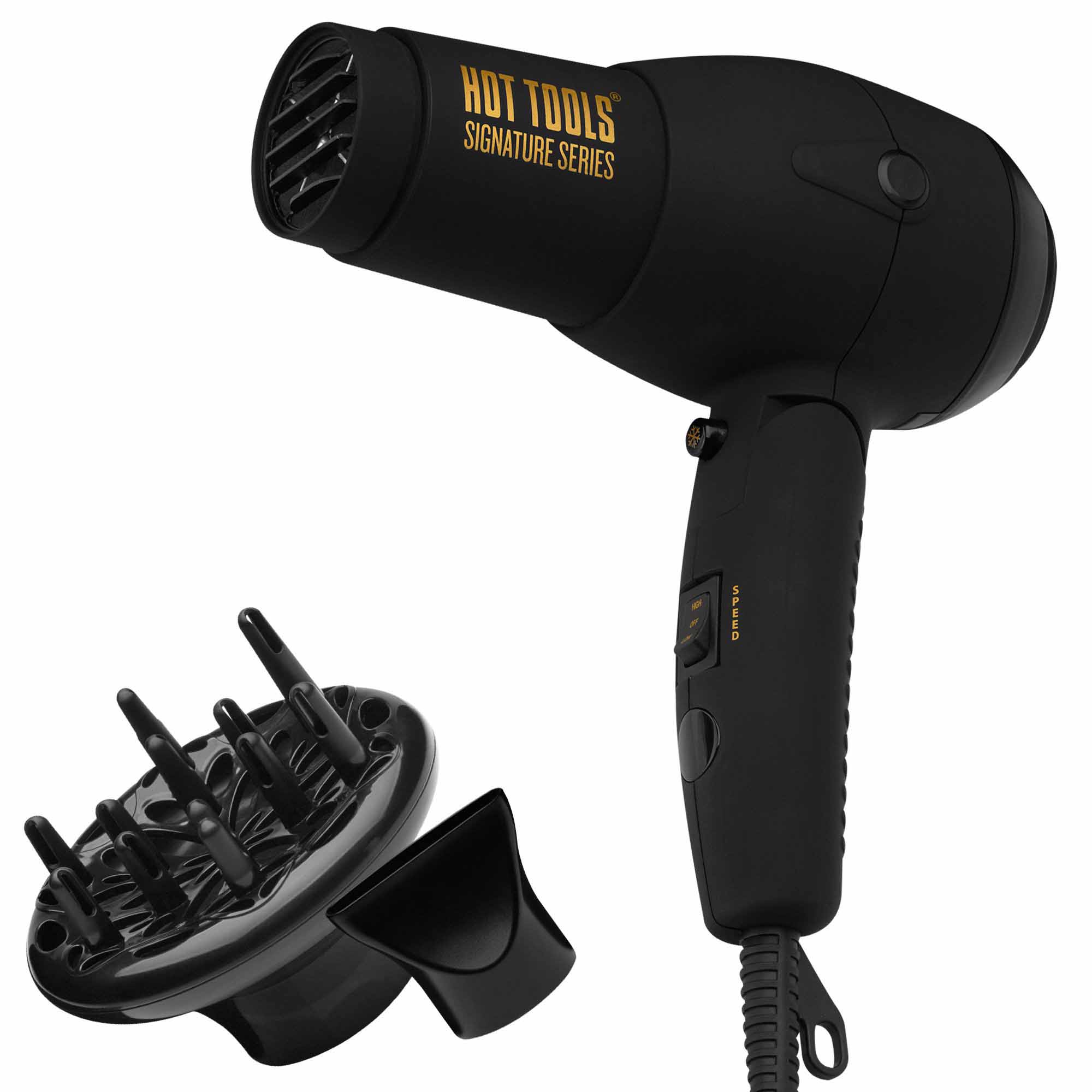 black travel hair dryer with attachments besides it