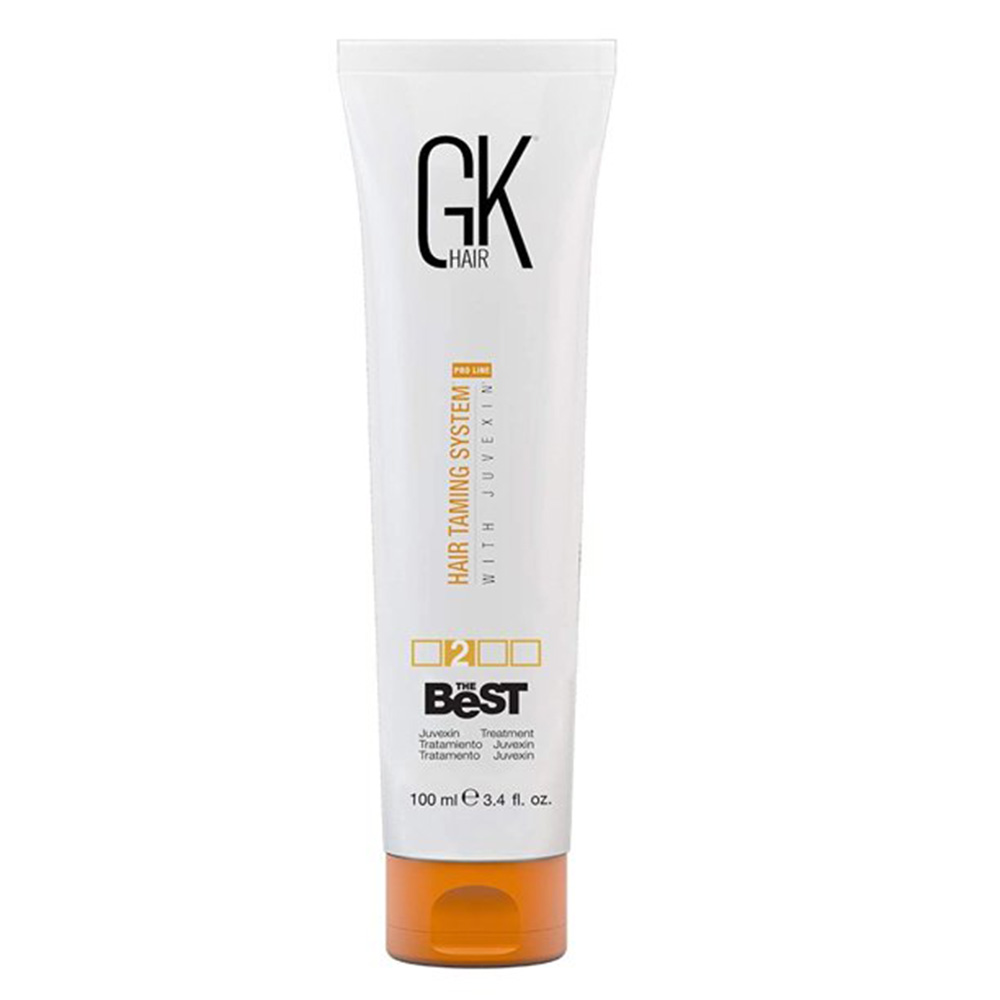 a white bottle of GK Hair The Best Smoothing Keratin Hair Treatment