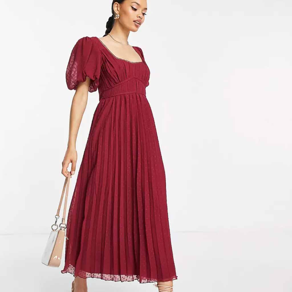 model wearing red pleated midi dress from ASOS