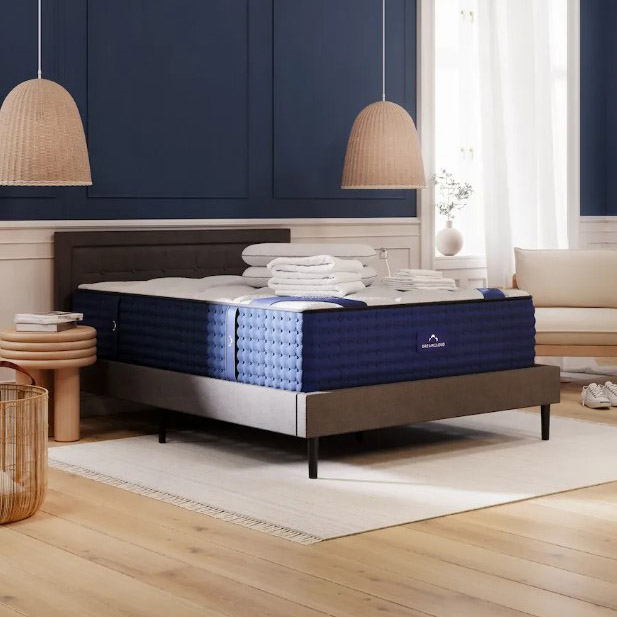 blue mattress in bedroom setting