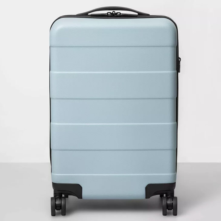 Hardside spinner suitcase in blue