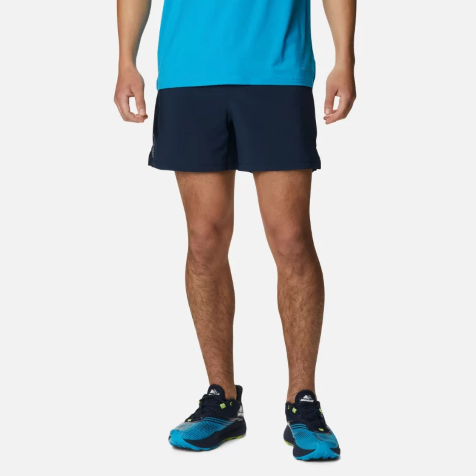 Man wearing dark blue gym shorts