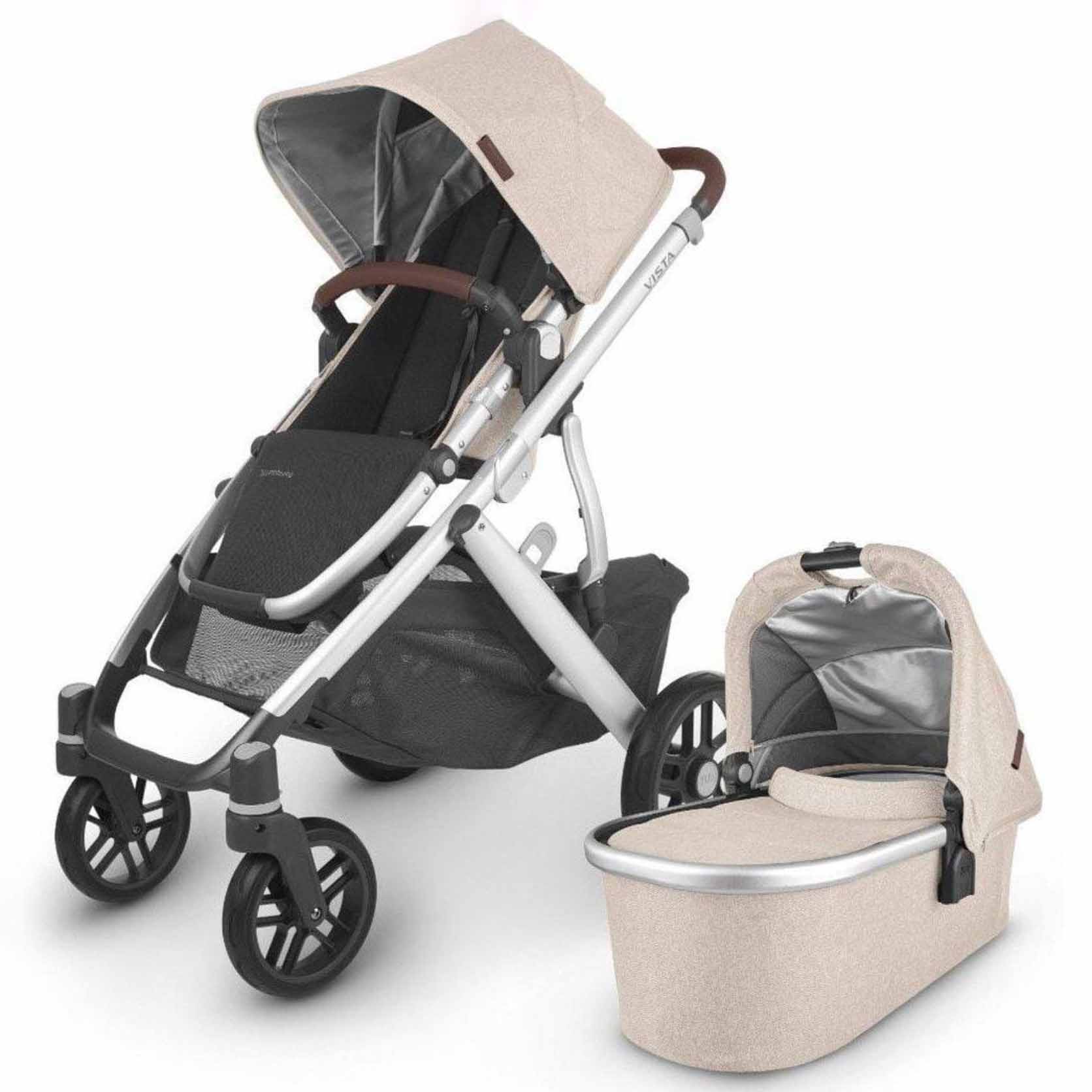Cream-colored stroller and bassinet