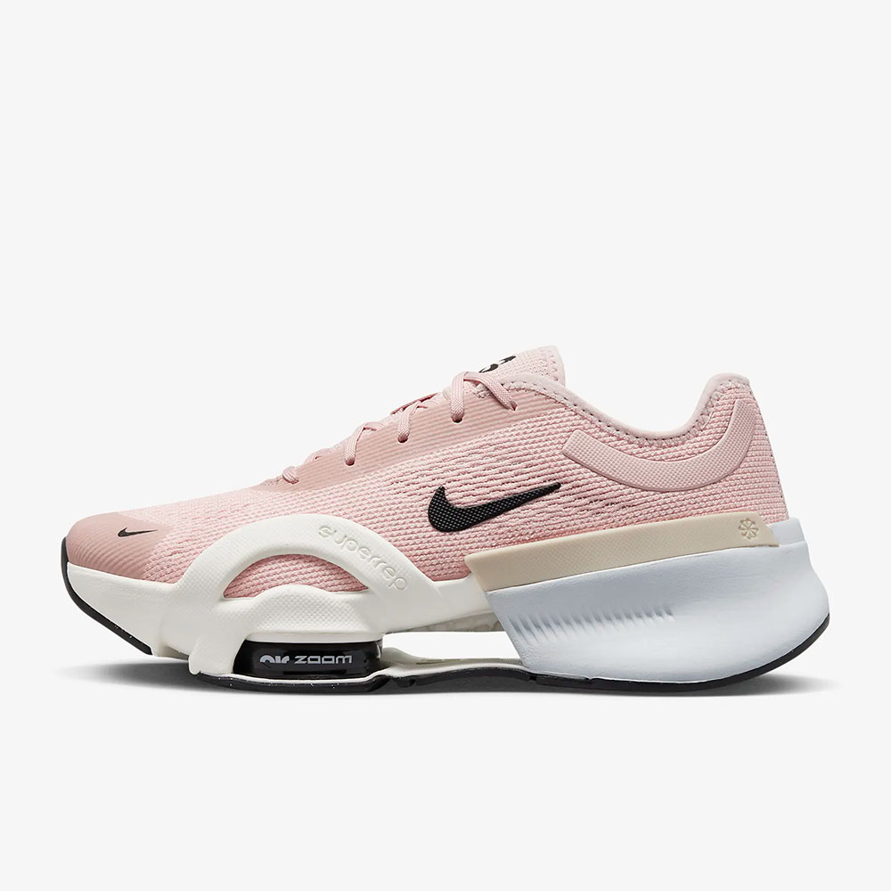the Nike ZOOM SuperRep 4 Next Nature sneaker in pink and white with black Nike logo