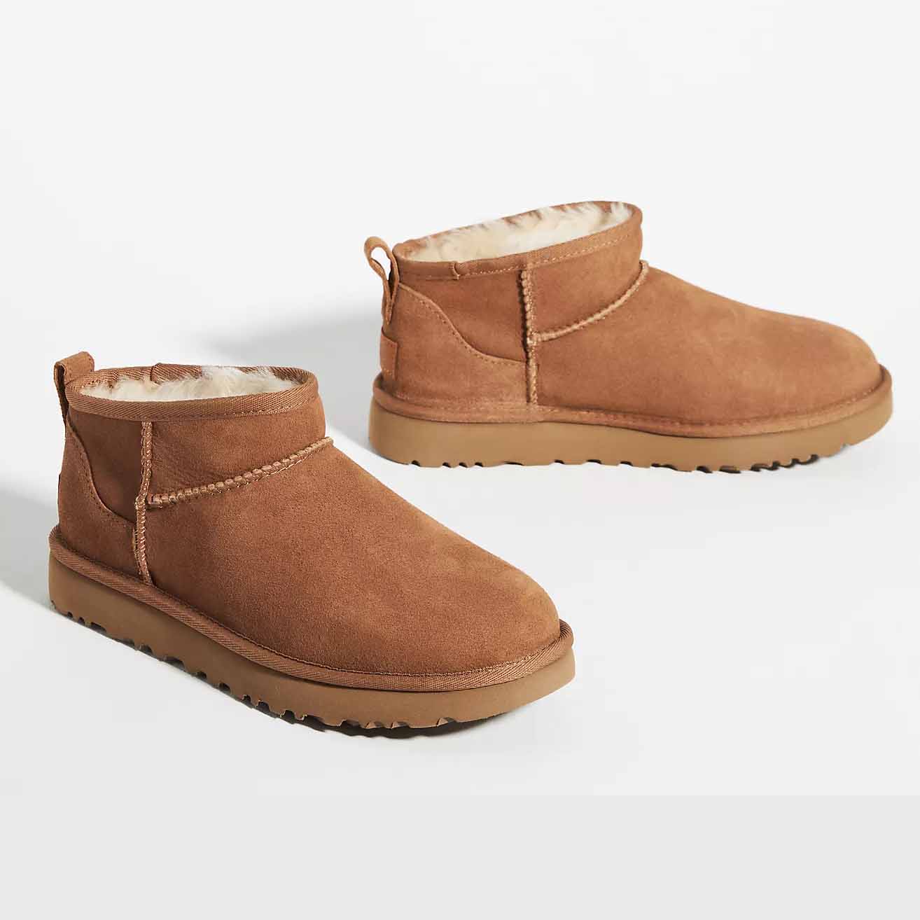 a pair of UGG Classic Ultra Mini Boots in brown