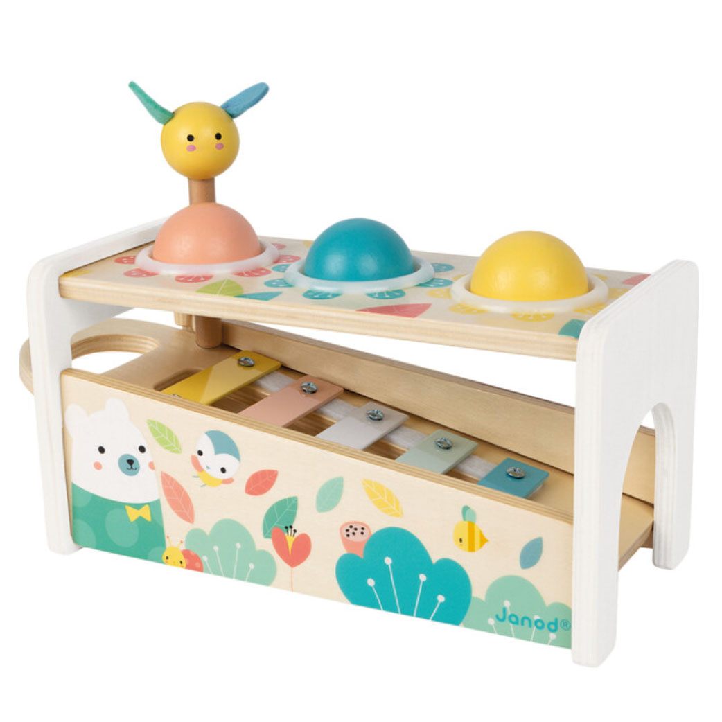 Colorful wooden xylophone with animal figurine