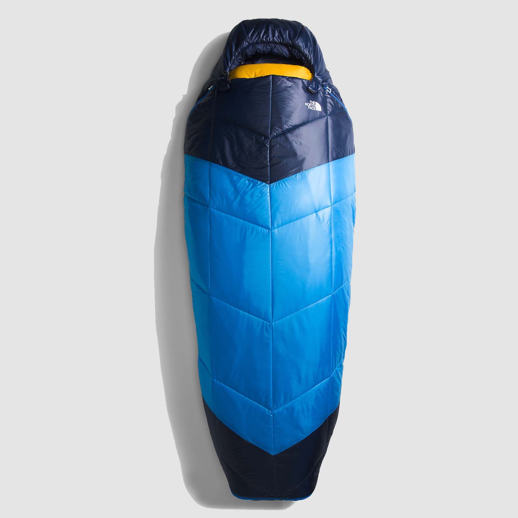 Image of blue and yellow North Face sleeping bag