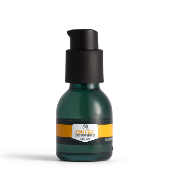 Green bottle of The Body Shop Cedar & Sage Conditioning Beard Oil