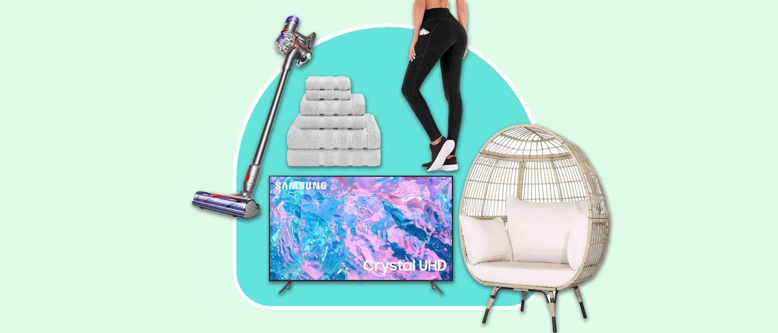 a Dyson hoover, Samsung TV, white towel pack, black leggings and an egg chair 