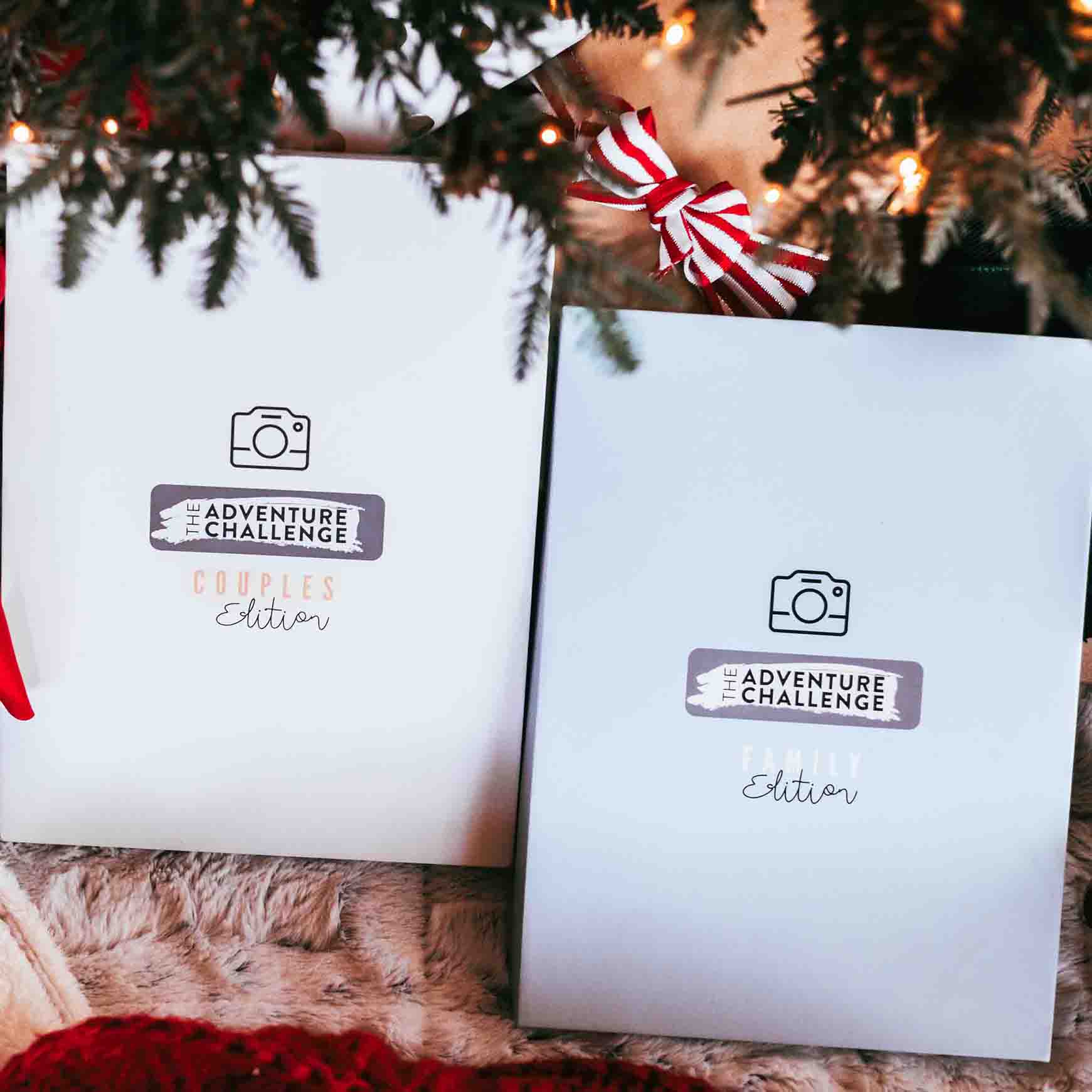 The Adventure Challenge Couples' Edition and Family Edition under a Christmas tree