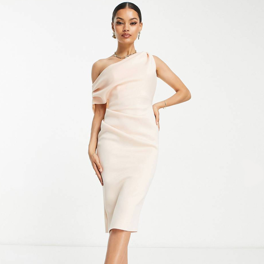 model posing in pale pink dress from ASOS