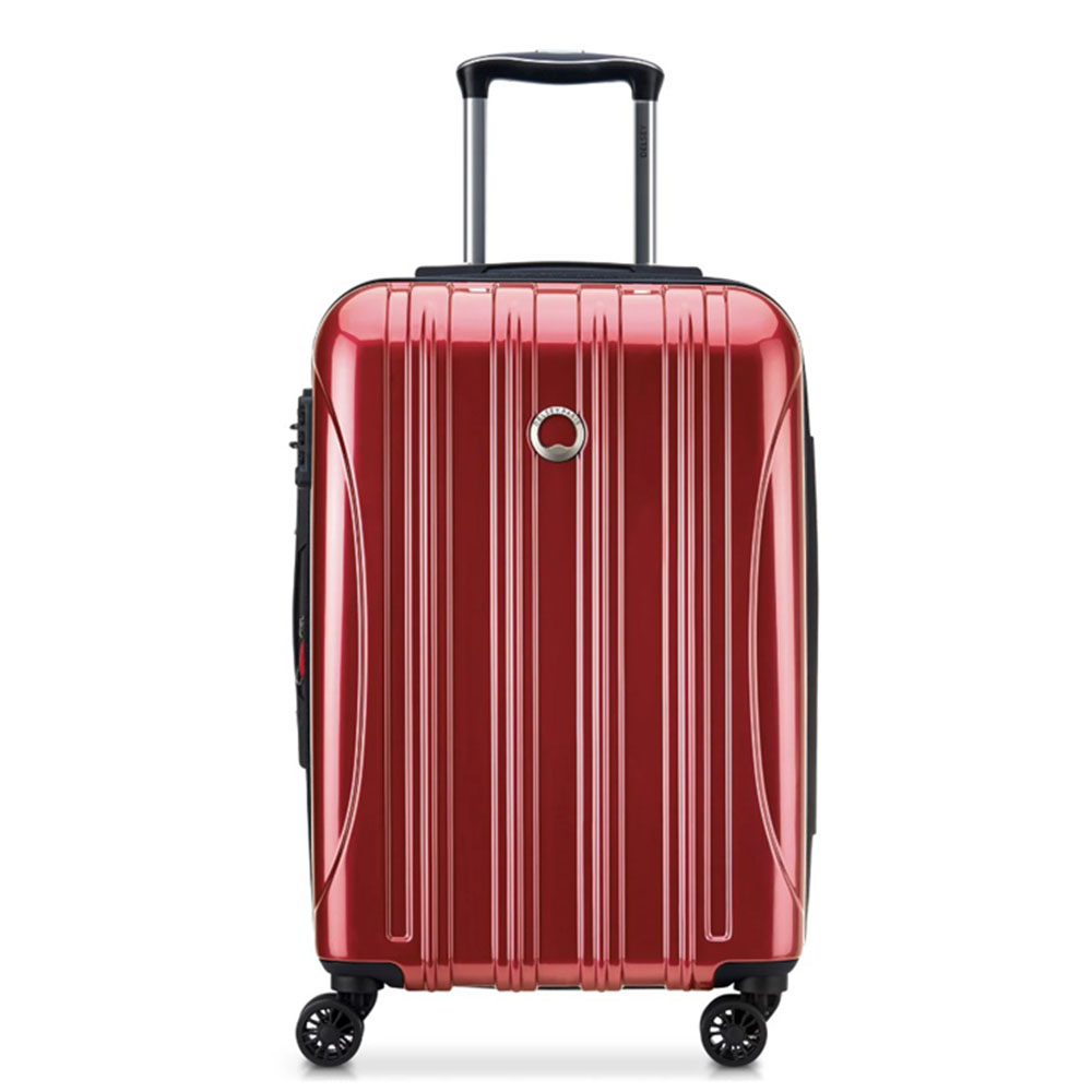 a red small hard shell suitcase
