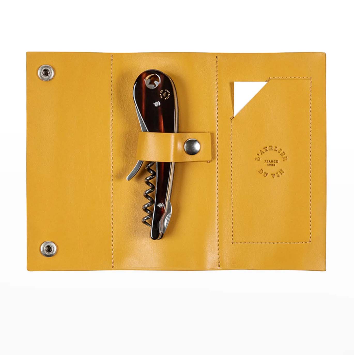 Bottle opener in yellow leather casing
